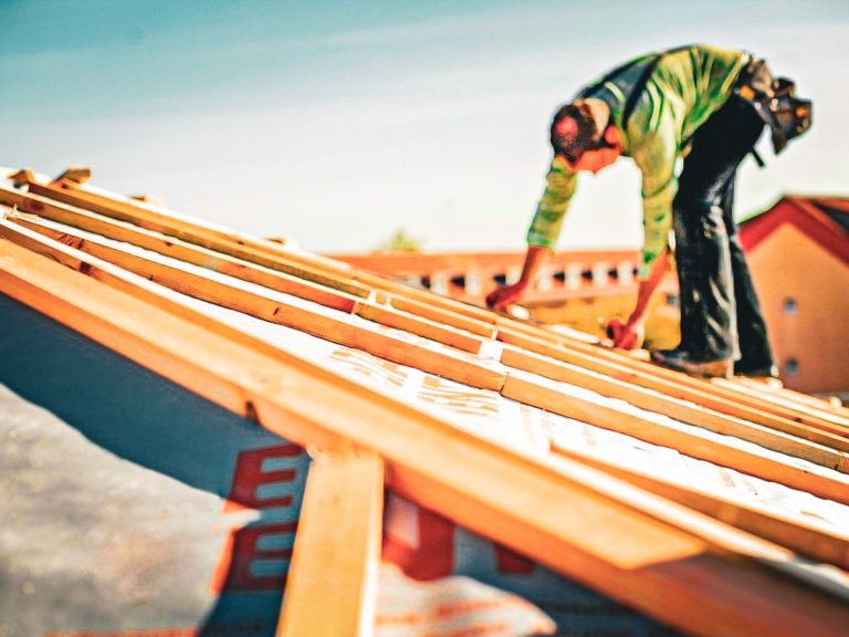 A professional roofing contractor installing a new roof installation as Southbound Roofing, professional roofing company in Nacogdoches Texas.